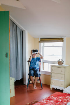 Young Boy Gettin' his VR Groove on