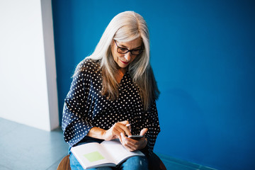 Senior businesswoman working at modern office.
