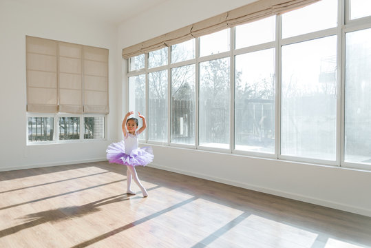 Girl dancing in ballet studio