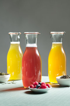 Alcohol free mocktails with berries and tea.
