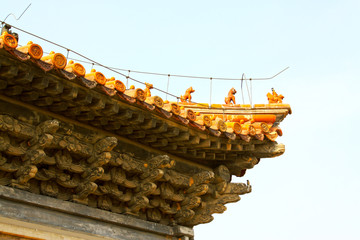 Temple eaves and beast sculpture
