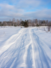 Fototapeta na wymiar rural road on a cold winter day