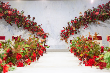 The wedding stage decorated with roses