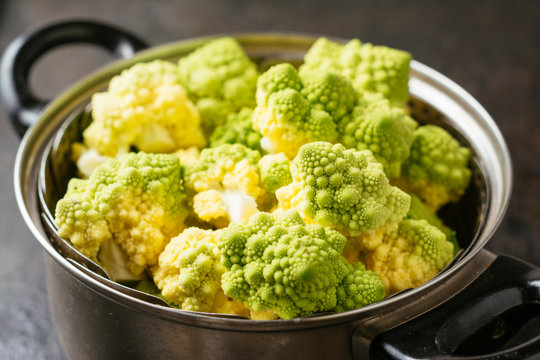 Romanesco in a pot with steamer