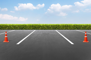 Empty parking lot In the park with blue sky background © sichon