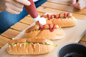 hot dog with ketchup and sausage