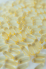 Close up of capsules Omega 3 on white background