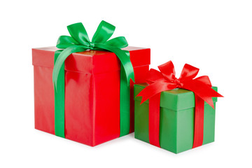 green and red gift box with a ribbon and a bow isolated.