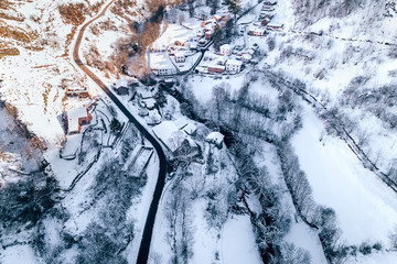 Aerial view of a small snowy village