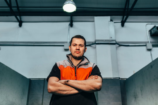 Repairman in the car workshop