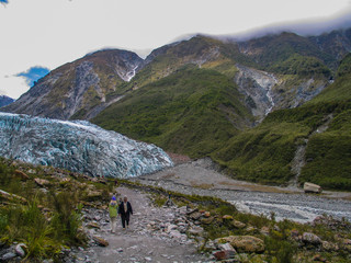 hiking in the mountains with glacier background