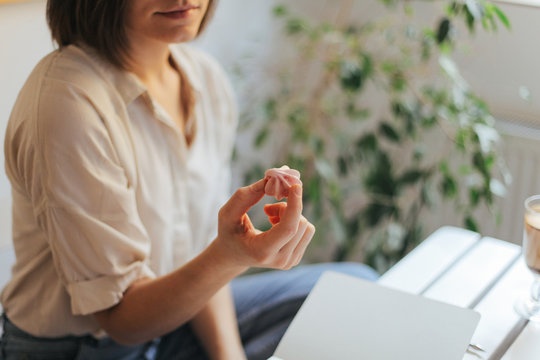 Woman holding a cookie