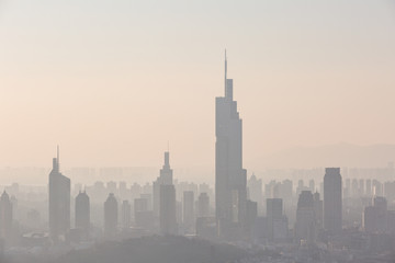 Fototapeta na wymiar Nanjing, China. Severe air pollution, haze and poor visibility make the tall buildings in the city hard to see clearly