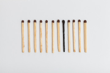 Matches forming sequence on slightly gray background