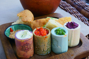 Oriental spices and appetizers on a dish