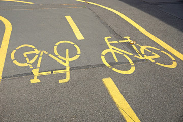 Bicycle road with yellow signs