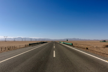 Desert roads, no man's land roads, under the sun