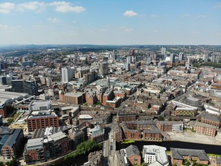 Aerial photo overlooking Leeds City Center in West Yorkshire showing buildings and businesses 