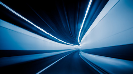 abstract car driving through tunnel.
