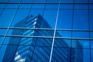 Obraz premium Urban abstract - windowed corner of office building.