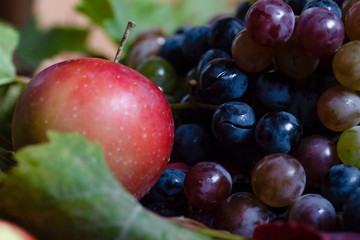 juicy ripe rural grapes with apple