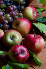 ripe rural apples with juicy grapes