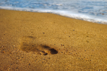 footprint on the sea beach sand