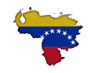 Karte und Fahne von Venezuela auf altem Leinen