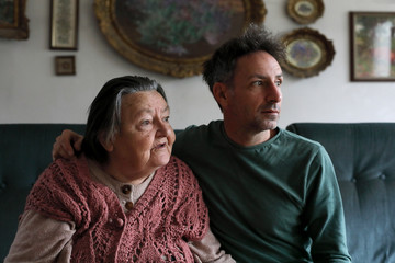 Adult son in a visit to his mum