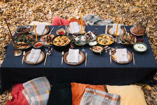 Outdoor dining setup, Table setting for the dinner party in the forest