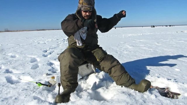 man winter fishing winter fishing
