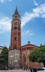 Fototapeta na wymiar Milan, Italy - 09 May 2018: San Gottardo Bell Tower in Milan, Italy. Architect Francesco Pecorari from Cremona. The first public mechanical clock in Milan is installed on the octagonal bell tower