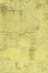 yellow stone wall