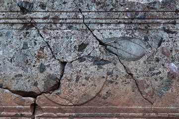 stone with a brown tint and cracks