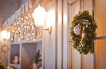 Christmas wreath on a door with a bump and a ball horizontal