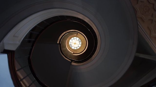 round stairs going up and turning