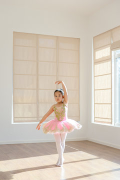 Girl dancing in ballet studio