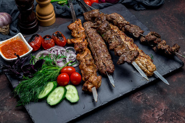 platter of different kebabs