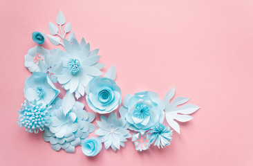 blue paper flowers on the pink background