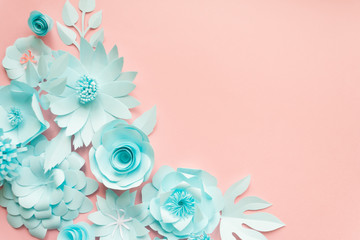 blue paper flowers on the pink background