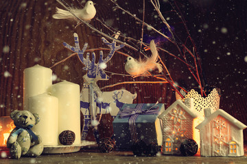 Composition candles branches cones