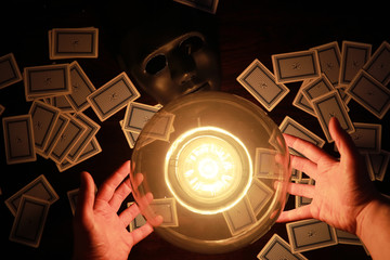 A sorcerer's table with a fortune-teller ball