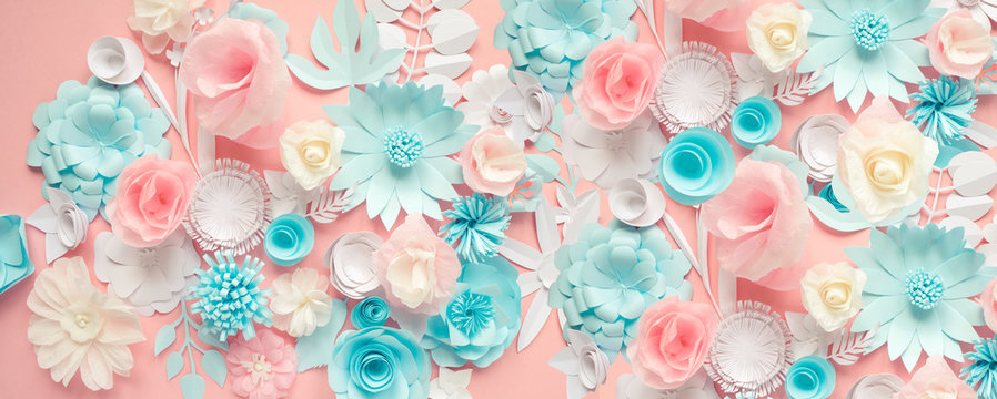 blue, pink and white paper flowers on pink background