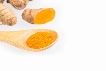 Turmeric powder and fresh turmeric - Curcuma longa.