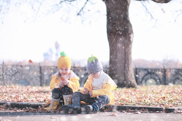 Kids walk in the park first snow