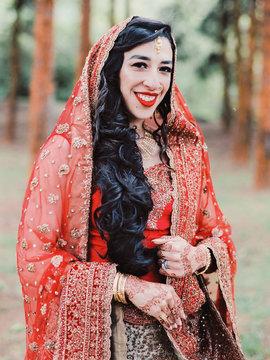 Portrait of an indian bride wearing traditional wedding sari