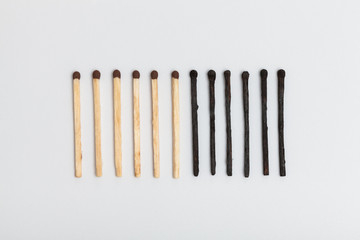 Matches forming sequence on slightly gray background