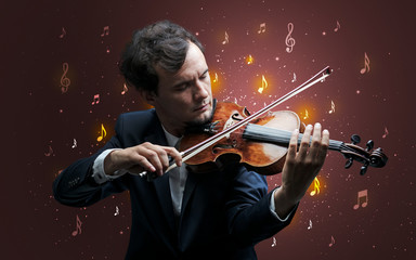Young violinist with falling musical notes wallpaper and classical concept