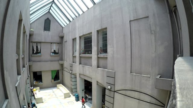 Many patients seeking medical attention queue patiently waiting at government hospital atrium lobby