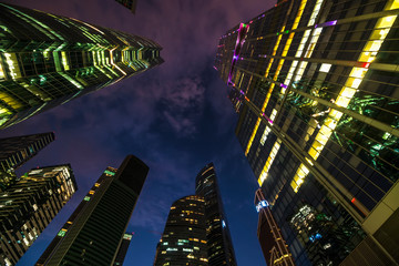 view of skyscrapers from the bottom up